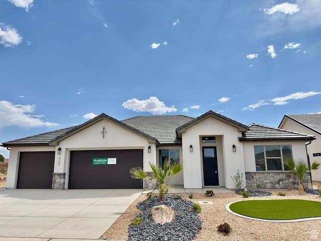 525 N 3380 W Unit 16, Hurricane, UT 84737 - single story home featuring stone siding, an attached garage, and stucco siding
