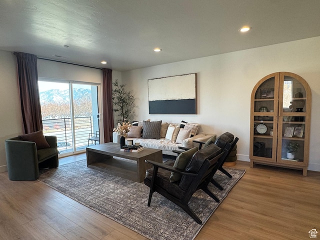 1590 S 900 W Unit 604, Salt Lake City, UT 84104 - living room with wood finished floors, recessed lighting, and baseboards