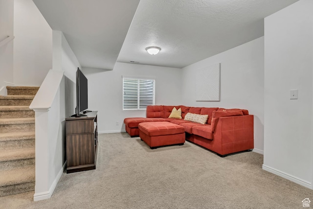 4988 W Mellow Way S, Jordan, UT 84009 - living room featuring light colored carpet, baseboards, stairs, and a textured ceiling