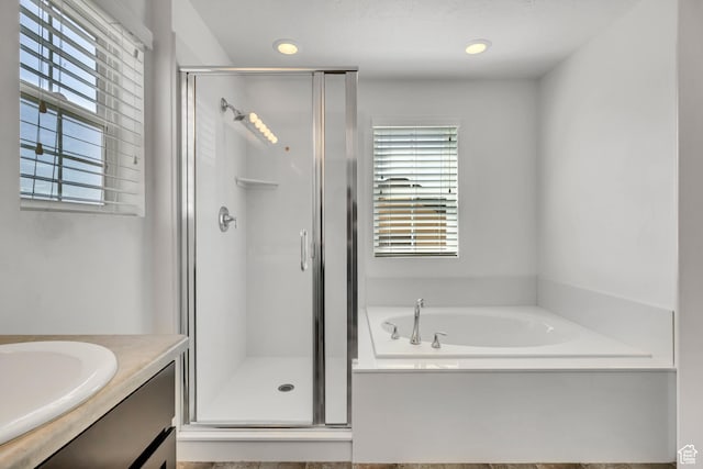 4988 W Mellow Way S, Jordan, UT 84009 - full bathroom with a stall shower, a bath, vanity, and recessed lighting