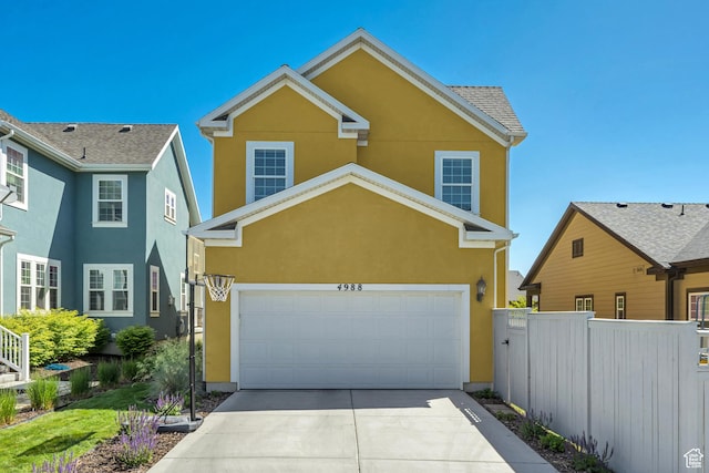 4988 W Mellow Way S, Jordan, UT 84009 - traditional-style home with stucco siding and concrete driveway