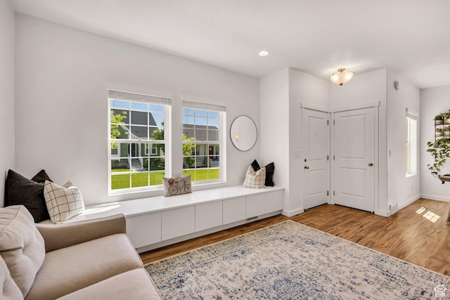 4988 W Mellow Way S, Jordan, UT 84009 - living room featuring light wood-style flooring, recessed lighting, and baseboards
