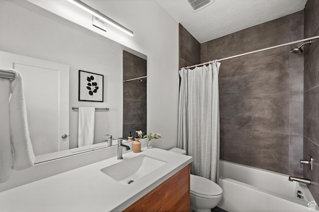 507 W Windmill Gate Cv, Draper, UT 84020 - bathroom featuring vanity, shower / tub combo, toilet, and a textured ceiling
