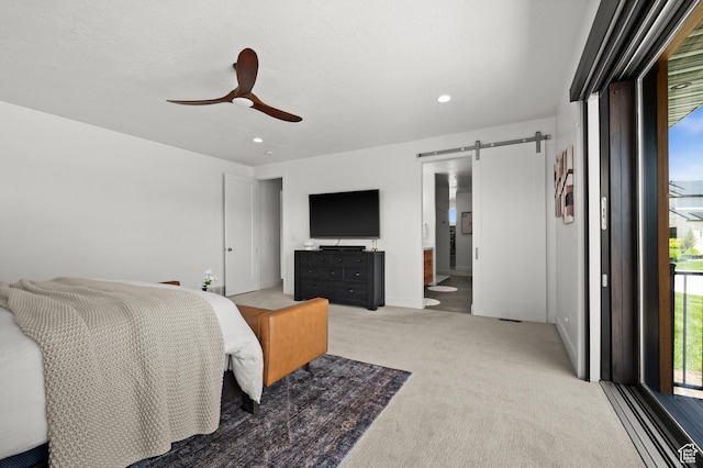 507 W Windmill Gate Cv, Draper, UT 84020 - bedroom featuring a barn door, light colored carpet, recessed lighting, a ceiling fan, and ensuite bathroom