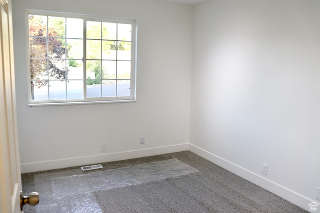 579 N 430 E Unit 2, Tooele, UT 84074 - unfurnished room with baseboards and carpet