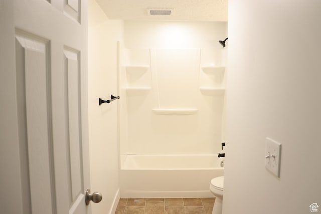 579 N 430 E Unit 2, Tooele, UT 84074 - bathroom with toilet, baseboards, and shower / bath combination