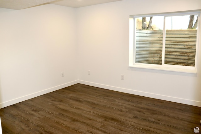579 N 430 E Unit 2, Tooele, UT 84074 - unfurnished room with dark wood finished floors and baseboards