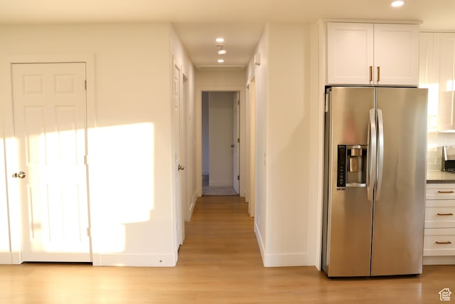 579 N 430 E Unit 2, Tooele, UT 84074 - kitchen featuring stainless steel fridge with ice dispenser, baseboards, light wood-style floors, recessed lighting, and white cabinets