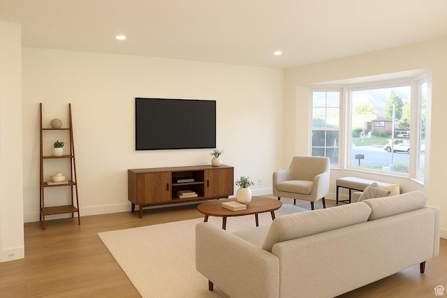 579 N 430 E Unit 2, Tooele, UT 84074 - living room featuring light wood-style floors and recessed lighting