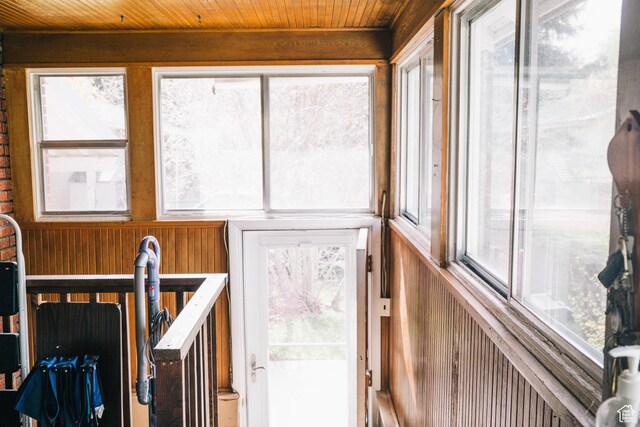 201 Bannock St, Malad City, ID 83252 - sunroom with wooden ceiling, healthy amount of natural light, and wooden walls