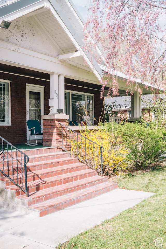 201 Bannock St, Malad City, ID 83252 - entrance to property with covered porch and brick siding