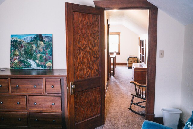 201 Bannock St, Malad City, ID 83252 - hallway with vaulted ceiling, carpet floors, and baseboards
