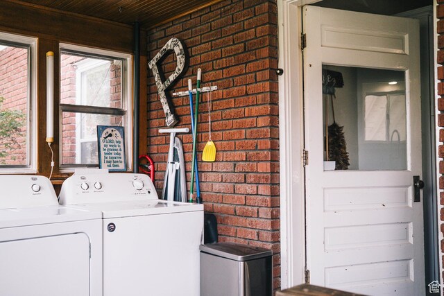 201 Bannock St, Malad City, ID 83252 - washroom featuring brick wall, separate washer and dryer, and wood ceiling