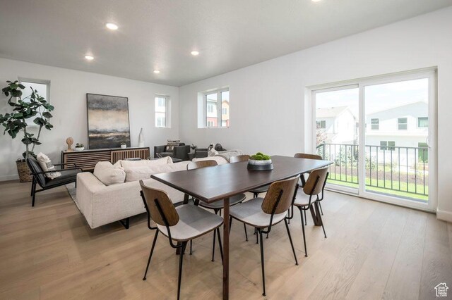 264 E Cedar Ln Unit 208, Midvale, UT 84070 - dining space with light wood finished floors and recessed lighting