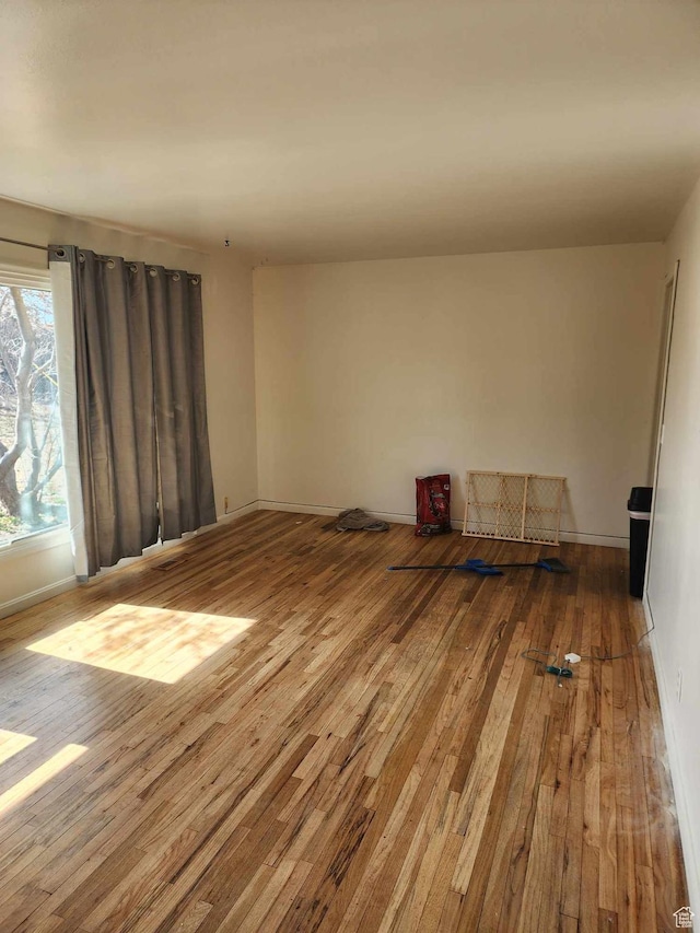 713 E 2nd St, Ogden, UT 84404 - unfurnished room featuring wood-type flooring and baseboards
