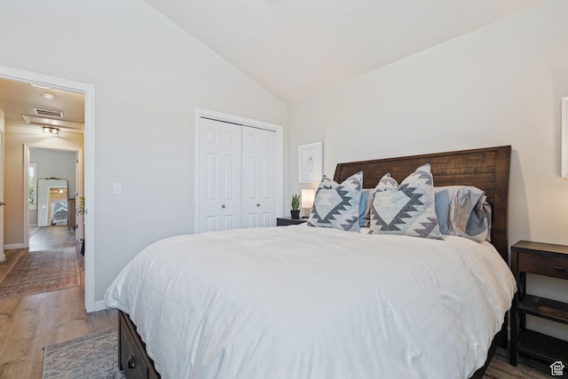 819 E 12085 S, Draper, UT 84020 - bedroom with wood finished floors, baseboards, a closet, and high vaulted ceiling