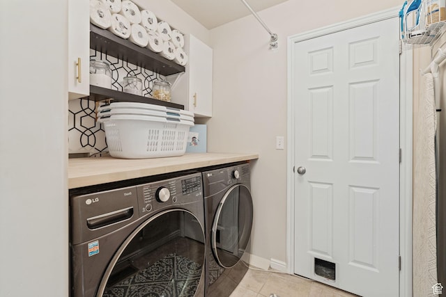 819 E 12085 S, Draper, UT 84020 - laundry area with cabinet space, washing machine and dryer, light tile patterned floors, and baseboards