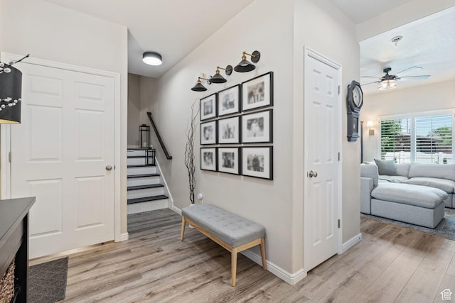 819 E 12085 S, Draper, UT 84020 - staircase featuring wood finished floors, a ceiling fan, and baseboards