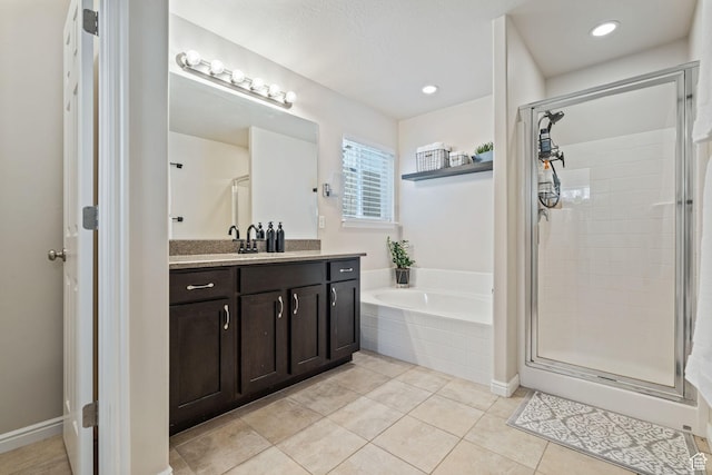 819 E 12085 S, Draper, UT 84020 - bathroom with vanity, a bath, a shower stall, tile patterned floors, and recessed lighting