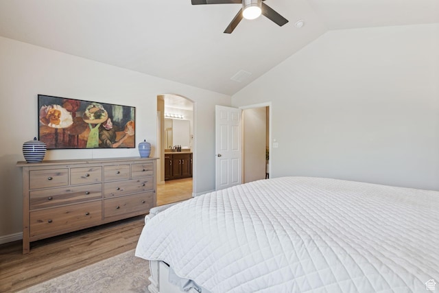 819 E 12085 S, Draper, UT 84020 - bedroom with light wood-style flooring, vaulted ceiling, arched walkways, ceiling fan, and ensuite bathroom