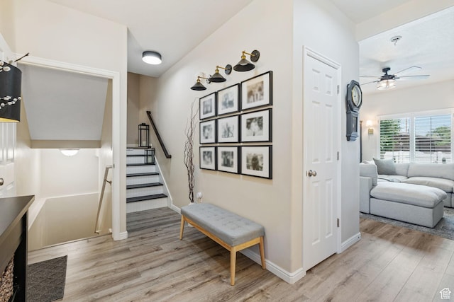 819 E 12085 S, Draper, UT 84020 - stairway featuring wood finished floors, a ceiling fan, and baseboards
