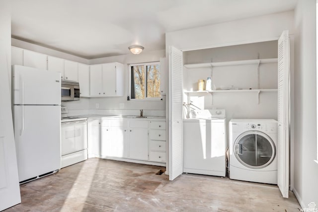 3185 S 4060 W, Salt Lake City, UT 84120 - washroom with washing machine and dryer