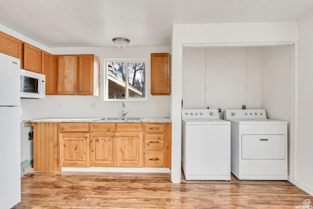 3185 S 4060 W, Salt Lake City, UT 84120 - laundry room featuring washer and dryer and light wood finished floors