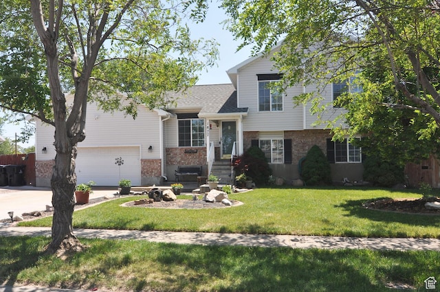 1877 W 2175 S, Syracuse, UT 84075 - tri-level home featuring brick siding, an attached garage, driveway, and a front lawn