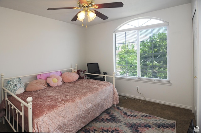 1877 W 2175 S, Syracuse, UT 84075 - carpeted bedroom with multiple windows, ceiling fan, and baseboards
