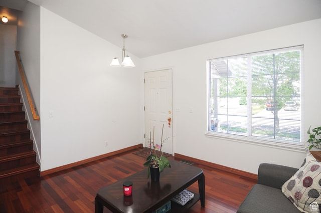 1877 W 2175 S, Syracuse, UT 84075 - living room featuring wood finished floors, healthy amount of natural light, stairway, vaulted ceiling, and baseboards