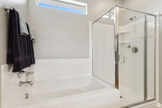 693 W Fireside Ln, Stansbury Park, UT 84074 - bathroom featuring a garden tub and a shower stall