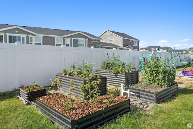 693 W Fireside Ln, Stansbury Park, UT 84074 - view of yard with a vegetable garden and a residential view