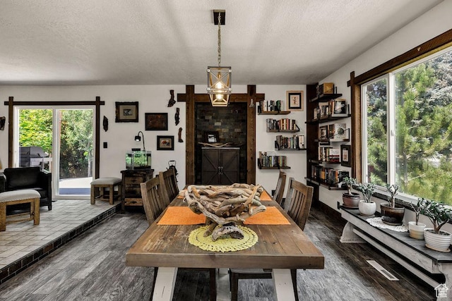 55 N 1300 E, Logan, UT 84321 - dining space featuring wood finished floors and a textured ceiling