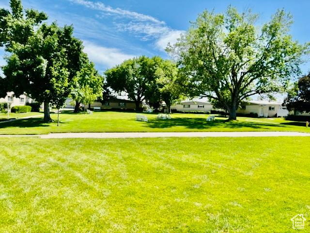 381 W 400 N Unit 12, Bountiful, UT 84010 - view of community featuring a lawn