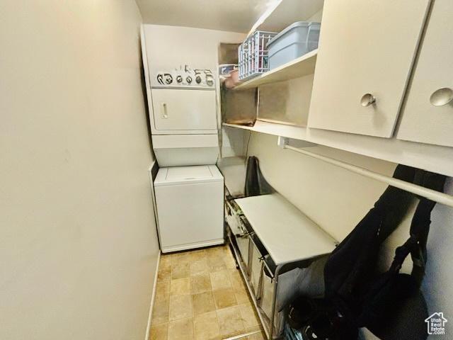 381 W 400 N Unit 12, Bountiful, UT 84010 - washroom featuring stacked washer / drying machine and pet washing station