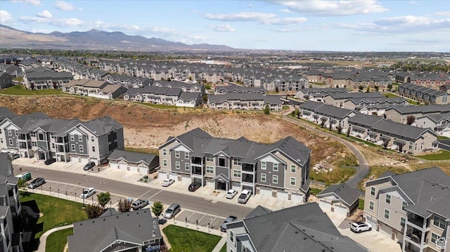 4192 W Mckellen Dr Unit B2, Herriman, UT 84096 - aerial view of property's location with nearby suburban area and a mountain backdrop