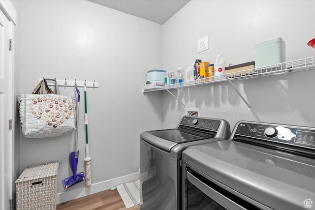 4192 W Mckellen Dr Unit B2, Herriman, UT 84096 - laundry room with separate washer and dryer, wood finished floors, and baseboards