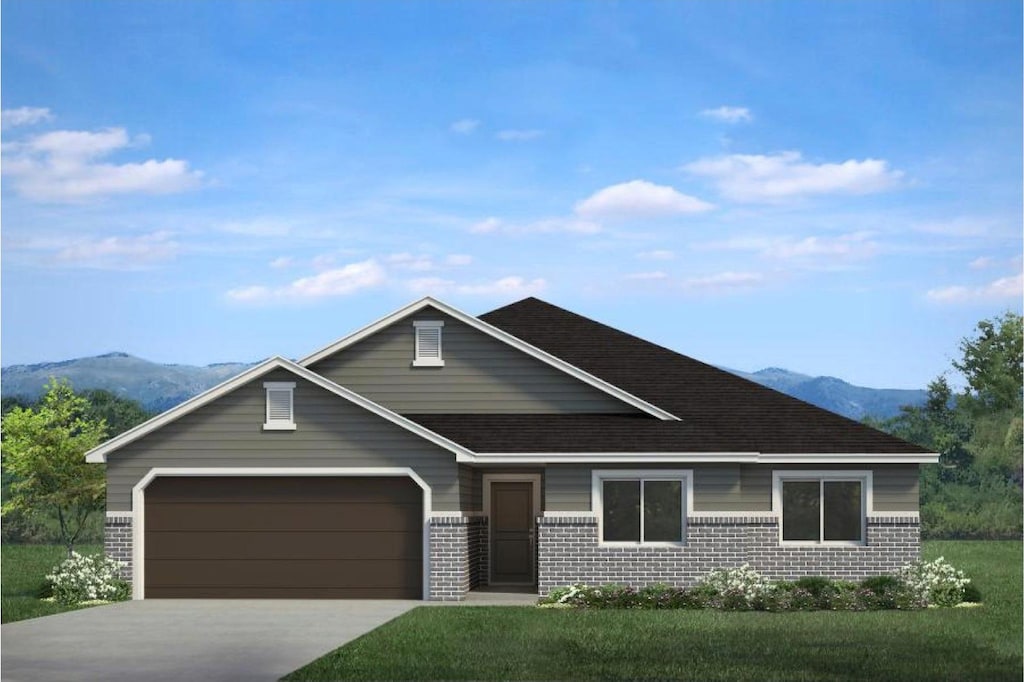 964 S 4475 W Unit 123, West Point, UT 84015 - view of front of home featuring brick siding, an attached garage, a front lawn, and a mountain view