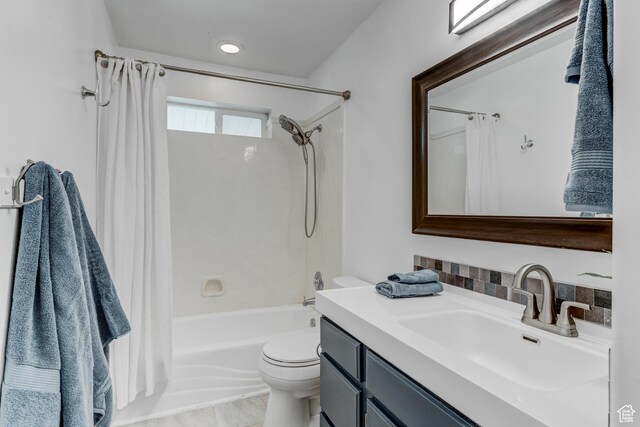 4799 S 3900 W, Roy, UT 84067 - full bath with vanity, shower / bathtub combination with curtain, toilet, and tasteful backsplash