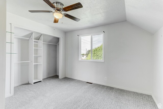 4799 S 3900 W, Roy, UT 84067 - unfurnished bedroom with carpet flooring, lofted ceiling, a closet, baseboards, and ceiling fan