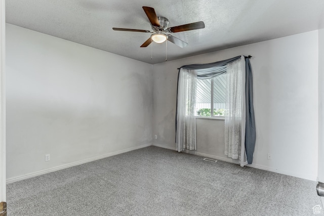 4799 S 3900 W, Roy, UT 84067 - spare room featuring carpet, a ceiling fan, a textured ceiling, and baseboards