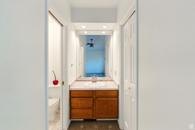1553 N 1525 E, Logan, UT 84341 - bathroom with toilet, vanity, a closet, recessed lighting, and a ceiling fan