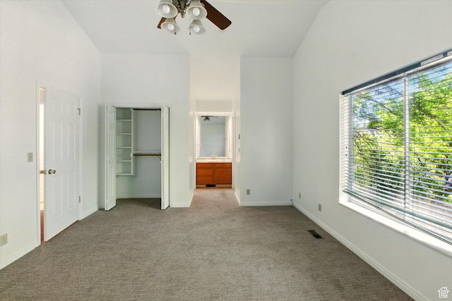 1553 N 1525 E, Logan, UT 84341 - unfurnished bedroom with multiple windows, light carpet, a closet, and ensuite bath