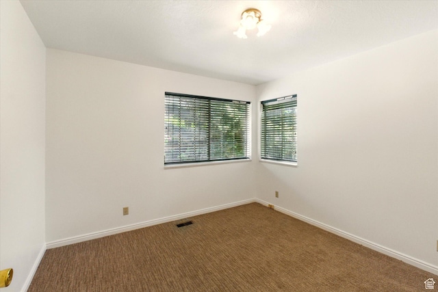 1553 N 1525 E, Logan, UT 84341 - carpeted empty room featuring healthy amount of natural light and baseboards