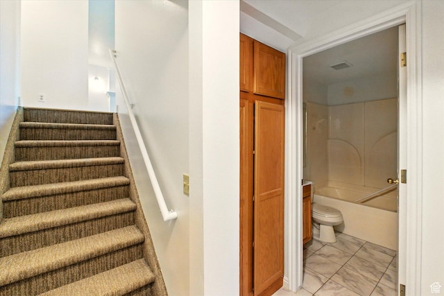 1553 N 1525 E, Logan, UT 84341 - staircase featuring marble look tiles