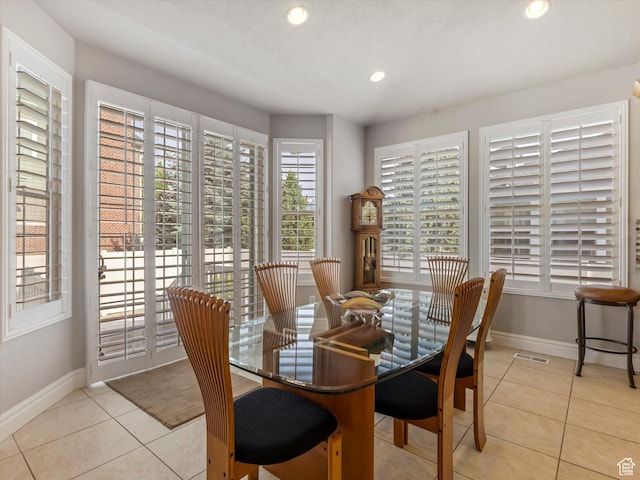5767 S Erekson Ln, Murray, UT 84107 - dining area with light tile patterned flooring, baseboards, and recessed lighting