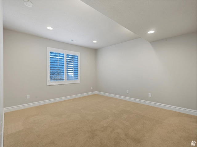 5767 S Erekson Ln, Murray, UT 84107 - spare room featuring light carpet, baseboards, recessed lighting, and a smoke detector