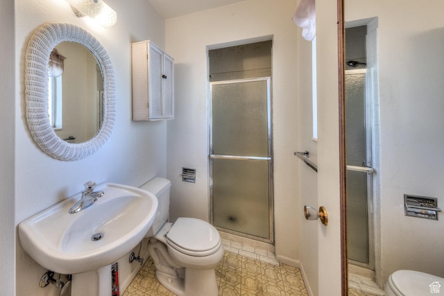 630 N 500 W, Moab, UT 84532 - full bath with toilet, a shower stall, a sink, and baseboards