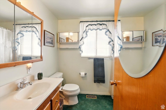 5226 S 200 W, Washington Terrace, UT 84405 - bathroom featuring vanity, toilet, and baseboards