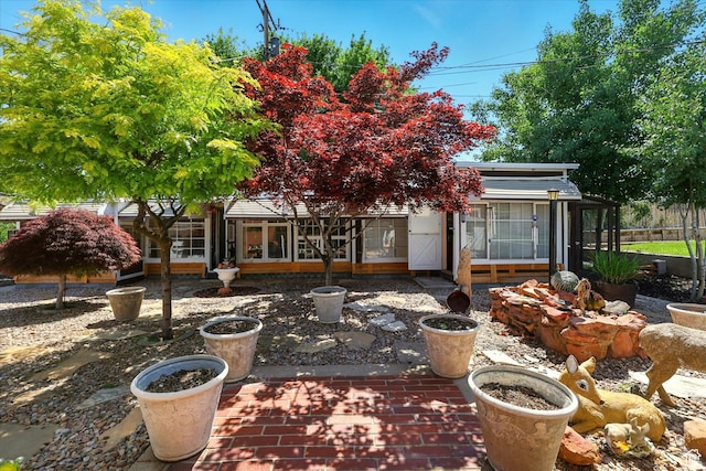 5226 S 200 W, Washington Terrace, UT 84405 - back of house with a sunroom